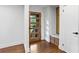 Entryway shows a modern wooden front door and a convenient built-in bench with storage at 800 Kiowa Ne Dr, Marietta, GA 30060