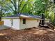 This home's side and back feature an attractive brick exterior and a relaxing deck area for outdoor enjoyment at 800 Kiowa Ne Dr, Marietta, GA 30060