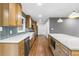 Modern kitchen with stainless steel appliances, white countertops, and bright wood cabinetry at 800 Kiowa Ne Dr, Marietta, GA 30060