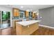 Spacious kitchen featuring stainless appliances, kitchen island and a view of the backyard at 800 Kiowa Ne Dr, Marietta, GA 30060
