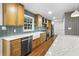 Modern kitchen with stainless steel appliances, white countertops, and bright wood cabinetry at 800 Kiowa Ne Dr, Marietta, GA 30060
