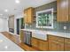 Modern kitchen features stainless steel appliances, white countertop and cabinets at 800 Kiowa Ne Dr, Marietta, GA 30060