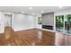 Living room with hardwood floors and a modern fireplace, with sliding doors to the outdoor space at 800 Kiowa Ne Dr, Marietta, GA 30060
