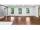 Bright living area with hardwood floors and large windows, offering ample natural light at 800 Kiowa Ne Dr, Marietta, GA 30060