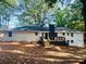 The backyard of this lovely home features a spacious deck perfect for outdoor entertaining at 800 Kiowa Ne Dr, Marietta, GA 30060