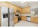 Well-equipped kitchen with stainless steel appliances and ample cabinet space at 113 Highgrove Pl, Mcdonough, GA 30253