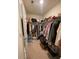 Walk-in closet with shelving and hanging racks for ample storage at 205 Sullivan St, Hampton, GA 30228