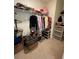 Walk-in closet with shelving and hanging racks for ample storage at 205 Sullivan St, Hampton, GA 30228