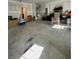 Spacious garage features concrete floors and ample space for parking and storage at 205 Sullivan St, Hampton, GA 30228
