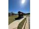 Community playground featuring a covered seating area and play equipment at 205 Sullivan St, Hampton, GA 30228