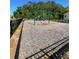 Community playground featuring a play set and swing set at 205 Sullivan St, Hampton, GA 30228