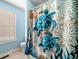 Charming bathroom with turtle-themed shower curtain and window at 33 Blue Springs Way, Dallas, GA 30157