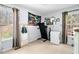 Inviting bedroom with two windows offering view of outdoors at 33 Blue Springs Way, Dallas, GA 30157