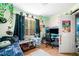 Well-lit bedroom featuring a desk, chair, and decorative lighting at 33 Blue Springs Way, Dallas, GA 30157