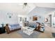 Open-concept living area showcases view into the dining room and bedroom at 33 Blue Springs Way, Dallas, GA 30157