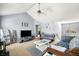 Comfortable living room with vaulted ceiling, ceiling fan, and neutral color palette at 33 Blue Springs Way, Dallas, GA 30157