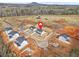 Aerial view of a new construction neighborhood with newly built homes and picturesque mountain views at 5130 Travers Ln, Cumming, GA 30040