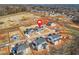 Aerial view of a new construction community with various styles of homes in a desirable location at 5130 Travers Ln, Cumming, GA 30040