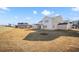 New home construction featuring a spacious backyard that is ready for customization and overlooks neighboring homes at 5130 Travers Ln, Cumming, GA 30040
