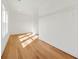 Spacious walk-in closet with hardwood floors, wire shelving, and lots of natural light at 5130 Travers Ln, Cumming, GA 30040