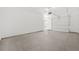 Spacious two car garage with overhead lighting, new garage door, and smooth concrete floors at 5130 Travers Ln, Cumming, GA 30040