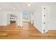 Bright and airy living room with hardwood floors, high ceilings, and an open floor plan at 5130 Travers Ln, Cumming, GA 30040