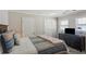 Neutral bedroom with two closets, large dresser, and comfy quilt at 957 Piedmont Ne Ave # A, Atlanta, GA 30309