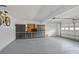 Spacious garage with built-in storage cabinets and high ceilings at 957 Piedmont Ne Ave # A, Atlanta, GA 30309