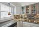 Bright kitchen showcasing granite countertops, stainless steel sink, and ample storage space at 957 Piedmont Ne Ave # A, Atlanta, GA 30309
