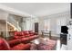 Spacious living room featuring a fireplace, hardwood floors, and ample natural light at 957 Piedmont Ne Ave # A, Atlanta, GA 30309