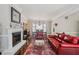 Inviting living room features a fireplace, hardwood floors, and comfortable seating at 957 Piedmont Ne Ave # A, Atlanta, GA 30309