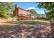 View of the backyard and house from back of property at 1085 Crown River Pkwy, Mcdonough, GA 30252
