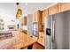 Kitchen with a large center island, stainless steel appliances and a gas range at 1085 Crown River Pkwy, Mcdonough, GA 30252