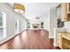 Expansive living room with hardwood floors, fireplace and great natural light from large windows at 1085 Crown River Pkwy, Mcdonough, GA 30252
