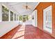 Bright and airy screened porch with views of the surrounding trees at 1085 Crown River Pkwy, Mcdonough, GA 30252