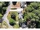 Aerial view of a home with manicured lawn, mature trees, and lengthy driveway at 2648 Kenwood Dr, Duluth, GA 30096