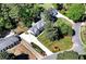 Spacious two-story home with a large driveway and mature trees at 2648 Kenwood Dr, Duluth, GA 30096