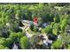 Aerial view showcases the property's location within a lush, wooded neighborhood at 2648 Kenwood Dr, Duluth, GA 30096