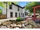 Beautiful backyard with a lovely water feature and meticulously kept landscaping at 2648 Kenwood Dr, Duluth, GA 30096
