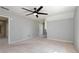 An empty bedroom featuring neutral carpet and gray walls at 2648 Kenwood Dr, Duluth, GA 30096
