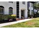 Inviting front entrance with landscaped flower beds and decorative trim at 2648 Kenwood Dr, Duluth, GA 30096