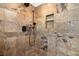 Shower with tile walls and a shower head at 2648 Kenwood Dr, Duluth, GA 30096