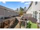 Outdoor deck area featuring comfortable patio furniture, artificial turf, and privacy fencing for relaxing and entertaining at 2709 Kemp Court, Conyers, GA 30094
