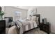 Comfortable bedroom features a well-made bed, soft pillows, side tables, and decorative accents for a relaxing retreat at 2709 Kemp Court, Conyers, GA 30094