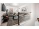Upstairs living room or loft with cozy seating and neutral color palette at 2709 Kemp Court, Conyers, GA 30094