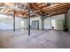 Unfinished basement features exposed ceiling, structural supports, and concrete floors at 4066 Harvest Ridge Dr, Douglasville, GA 30135