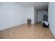 Spacious basement area with vinyl flooring, wainscoting and white painted walls at 4066 Harvest Ridge Dr, Douglasville, GA 30135