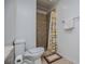 Bathroom featuring tiled shower and toilet at 4066 Harvest Ridge Dr, Douglasville, GA 30135