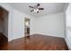 Hardwood floors and a view into the kitchen define this well-lit living space at 4066 Harvest Ridge Dr, Douglasville, GA 30135