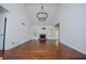 Spacious living room with a high ceiling, hardwood floors, a fireplace, and lots of natural light at 4066 Harvest Ridge Dr, Douglasville, GA 30135
